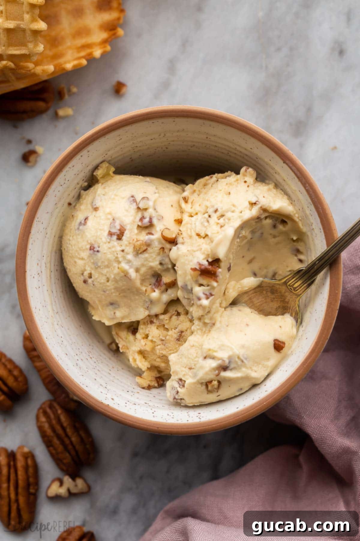 21 Must-Try Cuisinart Ice Cream Maker Recipes 14 butter pecan ice cream in a bowl