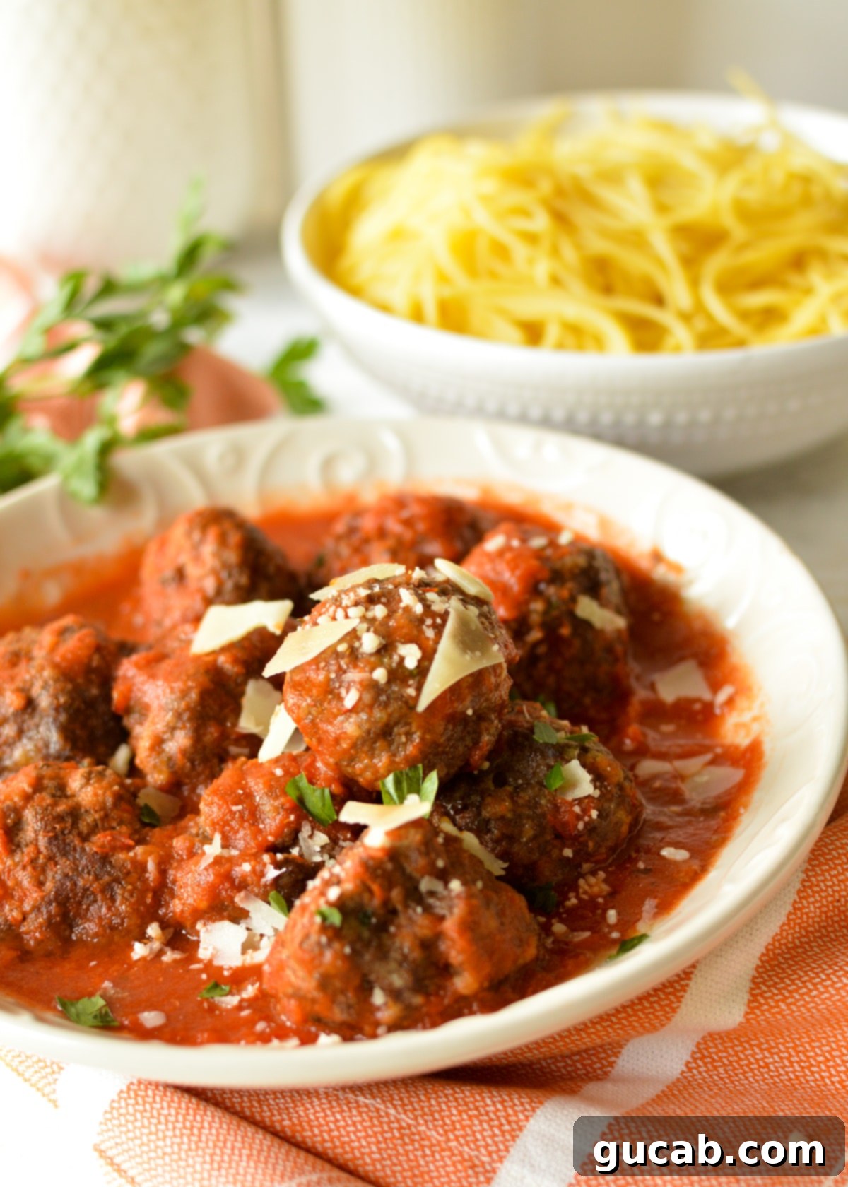 a bowl of gluten free meatballs in marinara sauce
