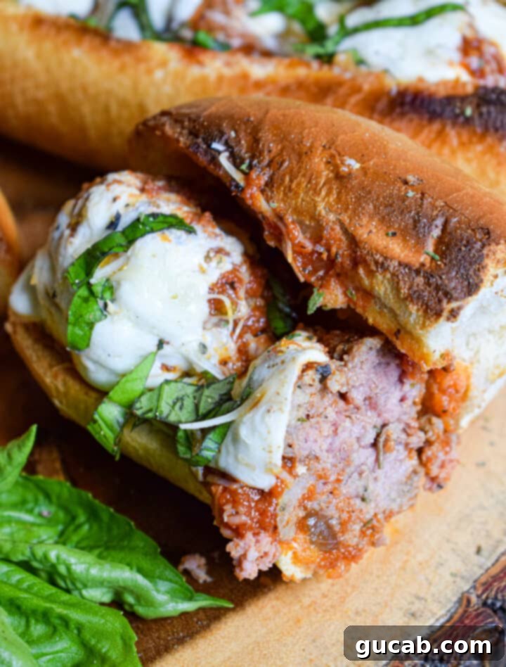 two mouth-watering Italian meatball subs with melted cheese