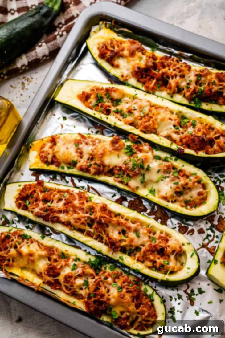 zucchini boats filled with sausage and cheese