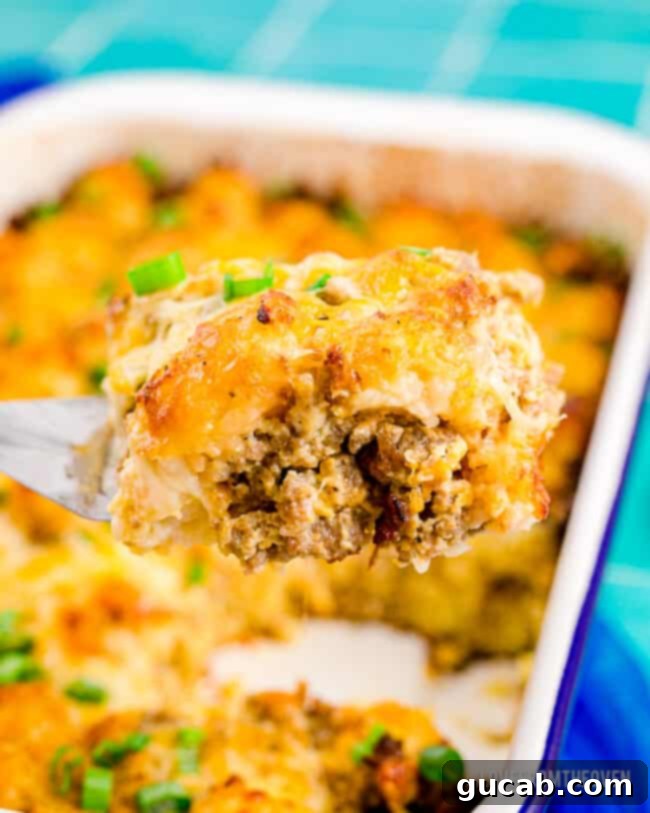 35 Incredible Ground Sausage Creations 6 A scoop of golden breakfast tater tot casserole with sausage