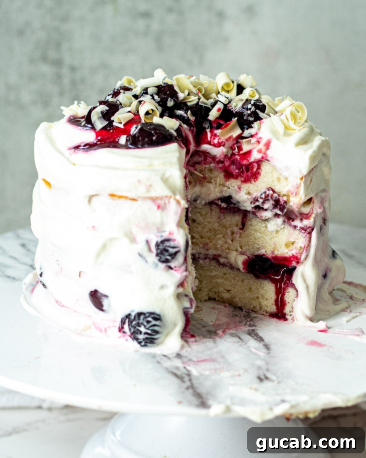 Beyond the Bowl: Creative Frozen Cherry Recipes 12 a white forest cake with cherries and white chocolate