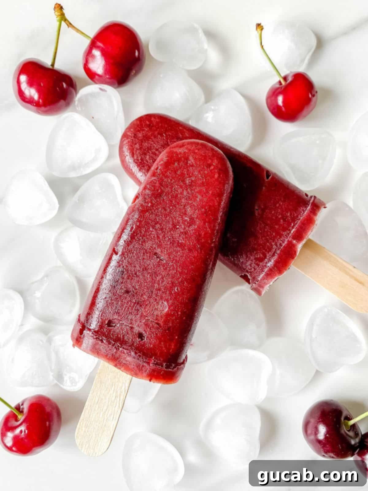 Beyond the Bowl: Creative Frozen Cherry Recipes 13 cherry popsicles on ice