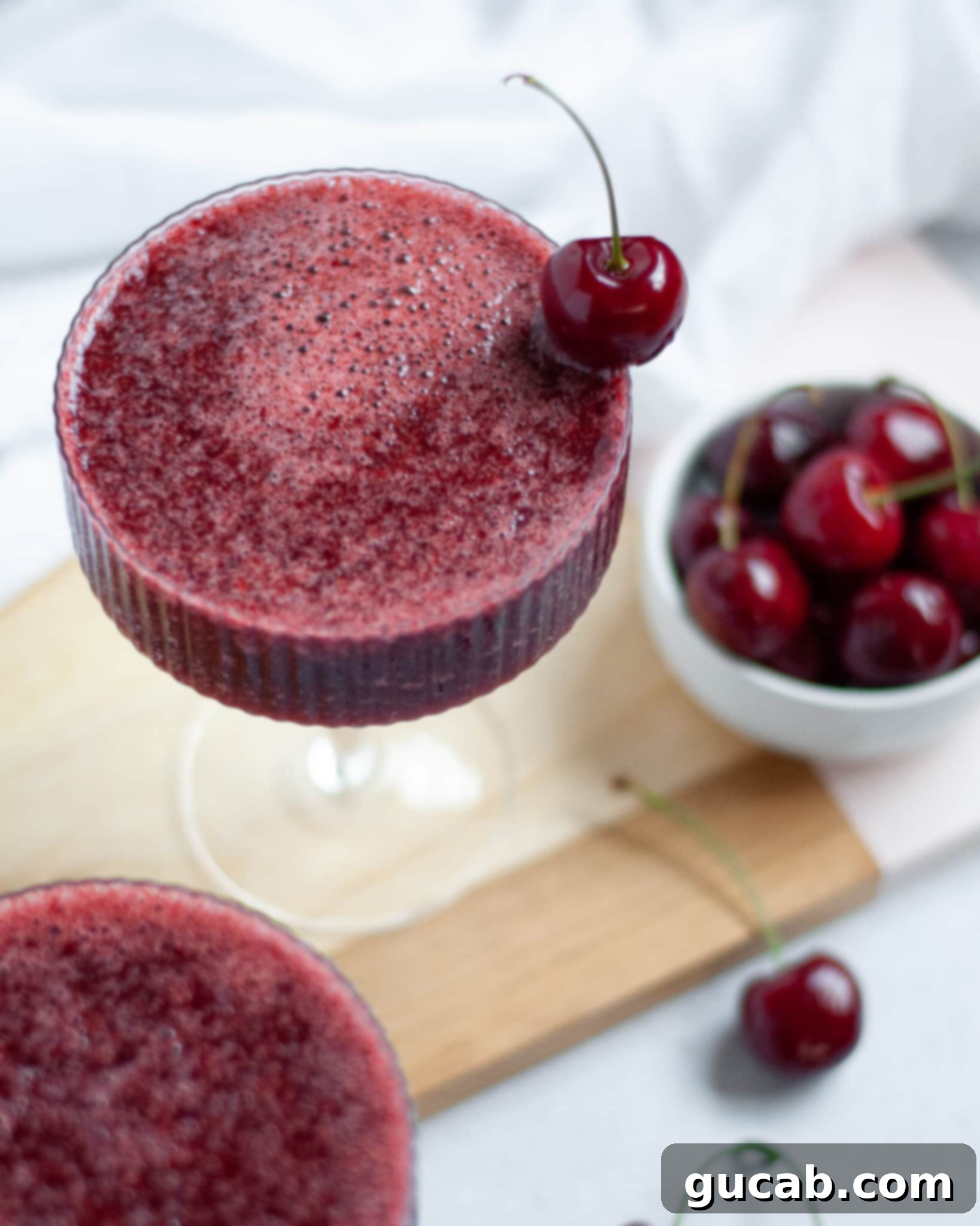 Beyond the Bowl: Creative Frozen Cherry Recipes 16 a cherry frozen cocktail