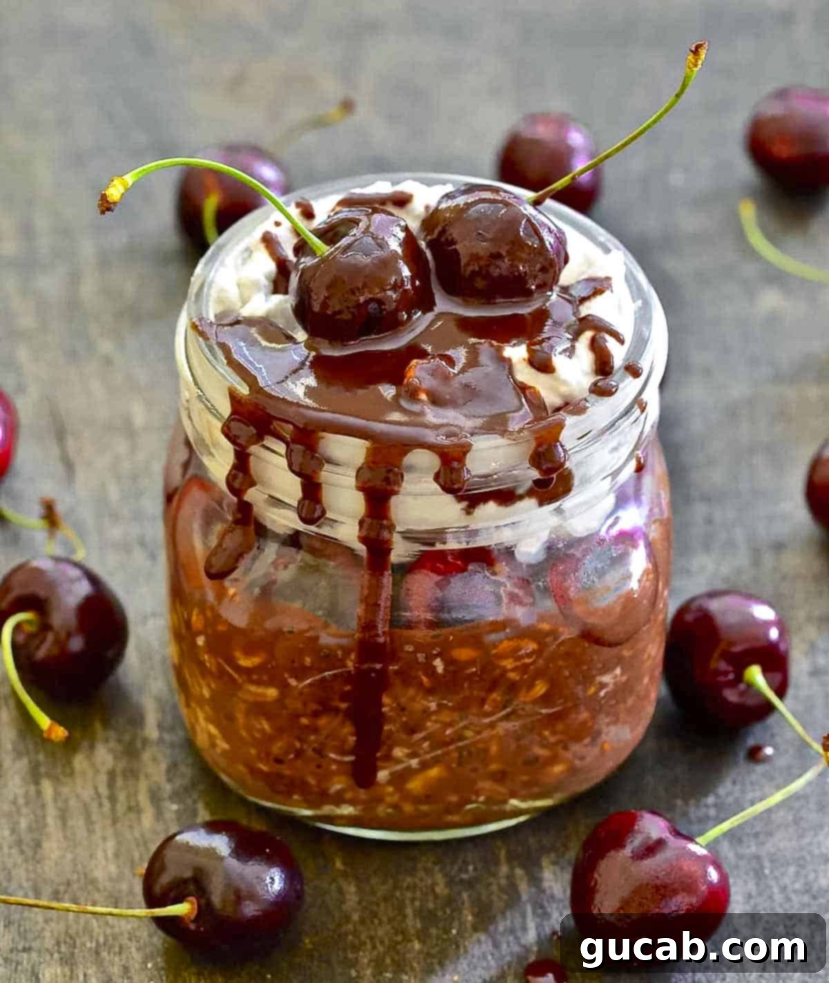 Beyond the Bowl: Creative Frozen Cherry Recipes 10 a jar of overnight oats with chocolate and cherries