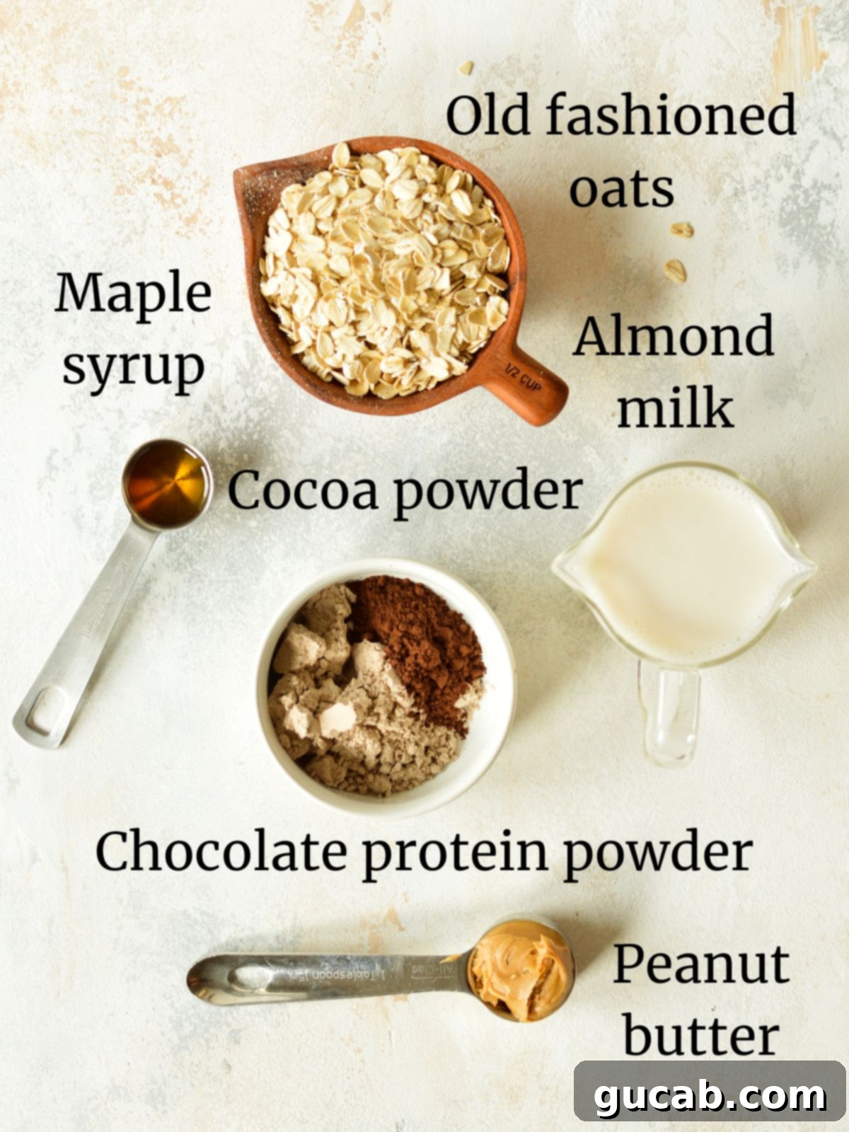 High Protein Overnight Oats 3 oats, almond milk, peanut butter, protein powder, cocoa powder, and maple syrup