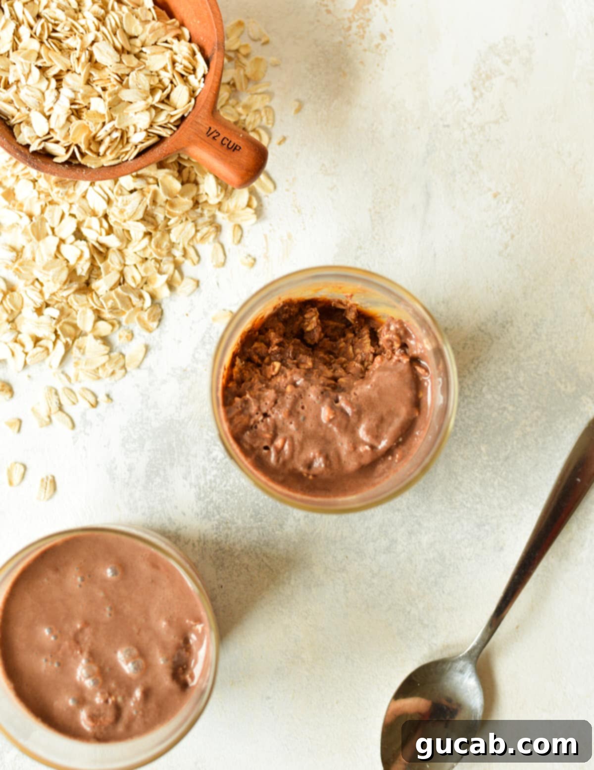 two glasses of chocolate protein overnight oats