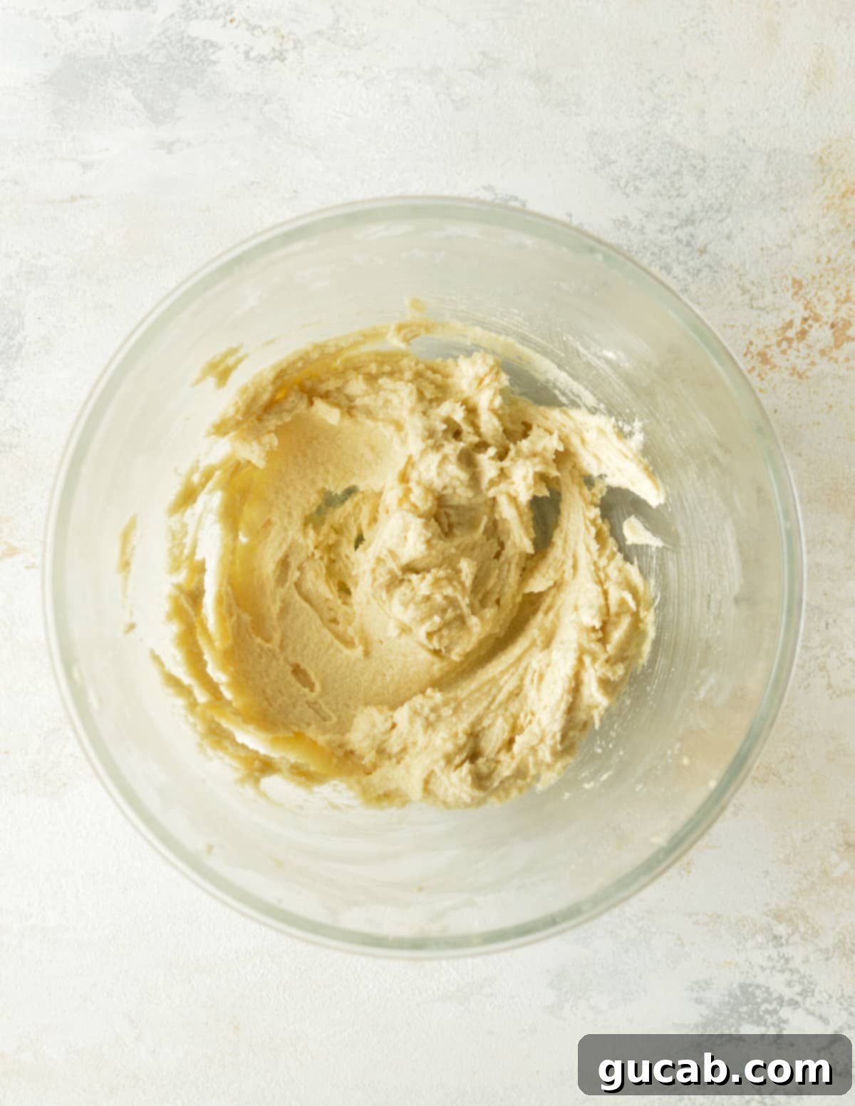 Tropical Pecan Cookie Bliss 4 a bowl of creamed butter & sugar