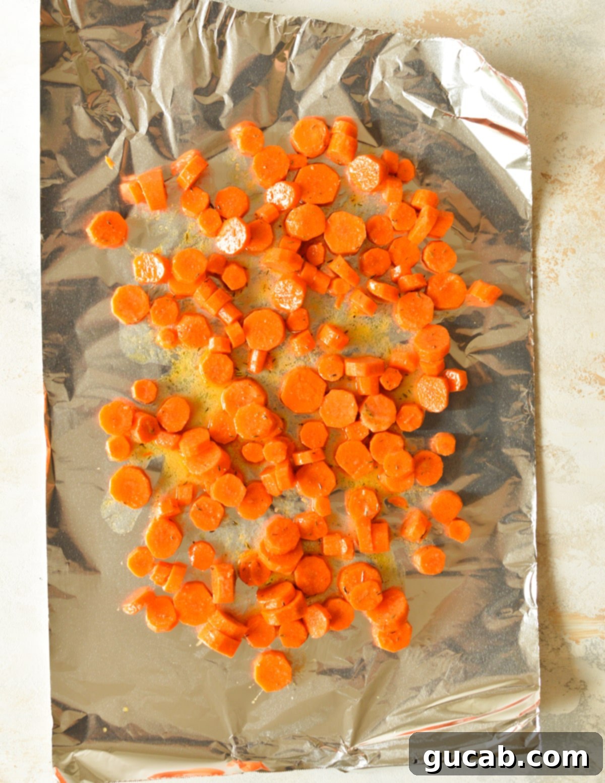 glazed carrots on foil