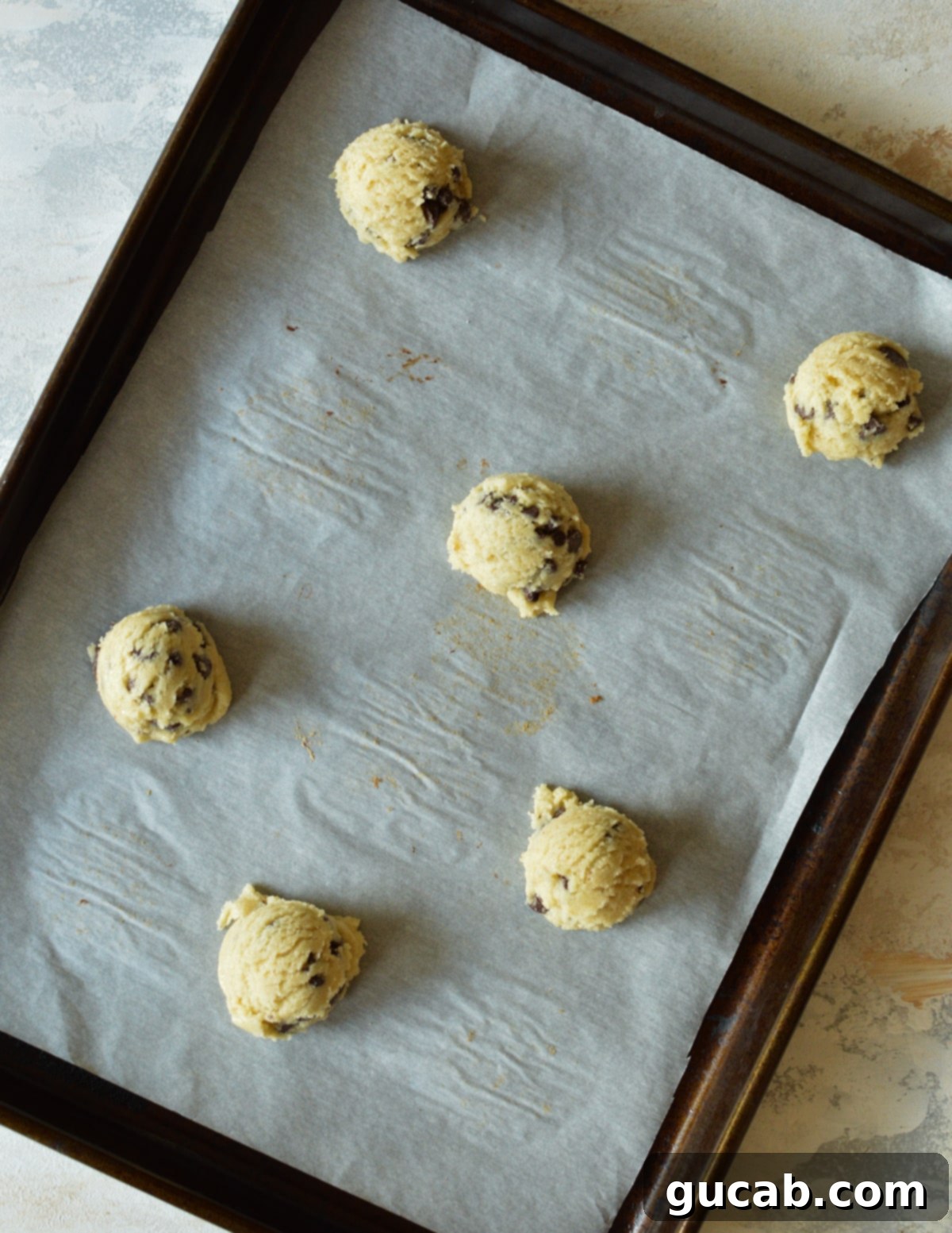 a sheet pan with cookies on it