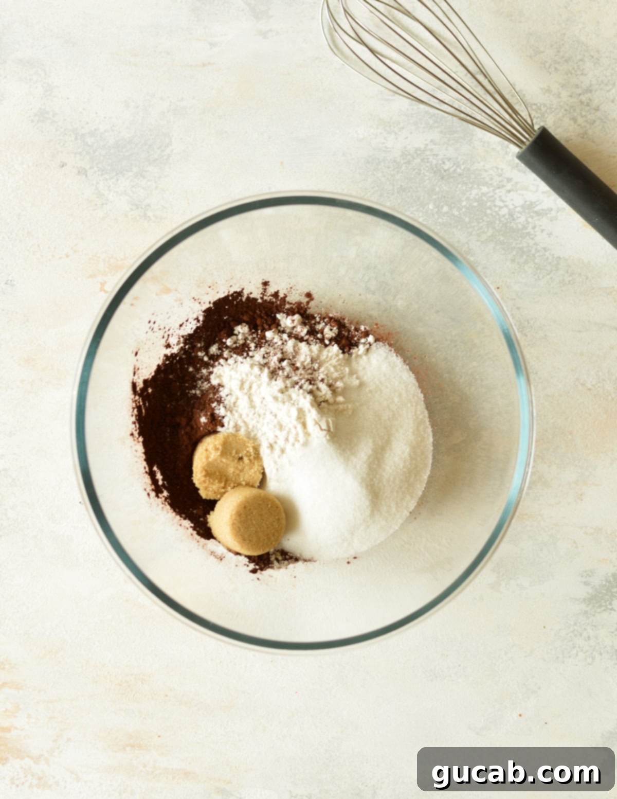 Ultimate No-Bake Brownie Batter 4 cocoa powder, flour, sugar, and brown sugar in a bowl