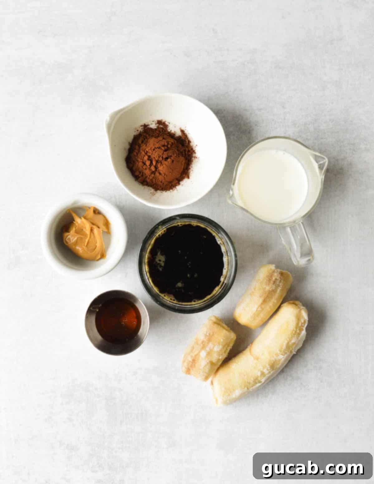 cocoa powder, milk, coffee, peanut butter, honey, frozen banana. 