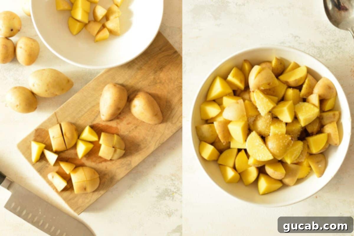 Freshly cut honey gold potatoes in a bowl, ready for seasoning and roasting.