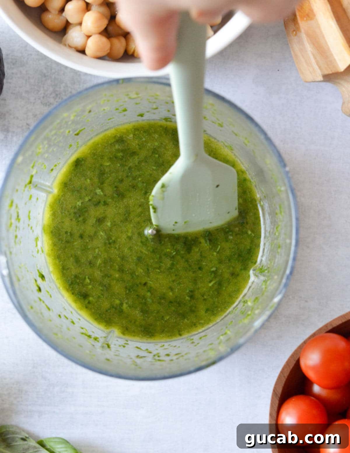 Vibrant Herb & Quinoa Power Bowl 7 herb vinaigrette in a mini food processor.