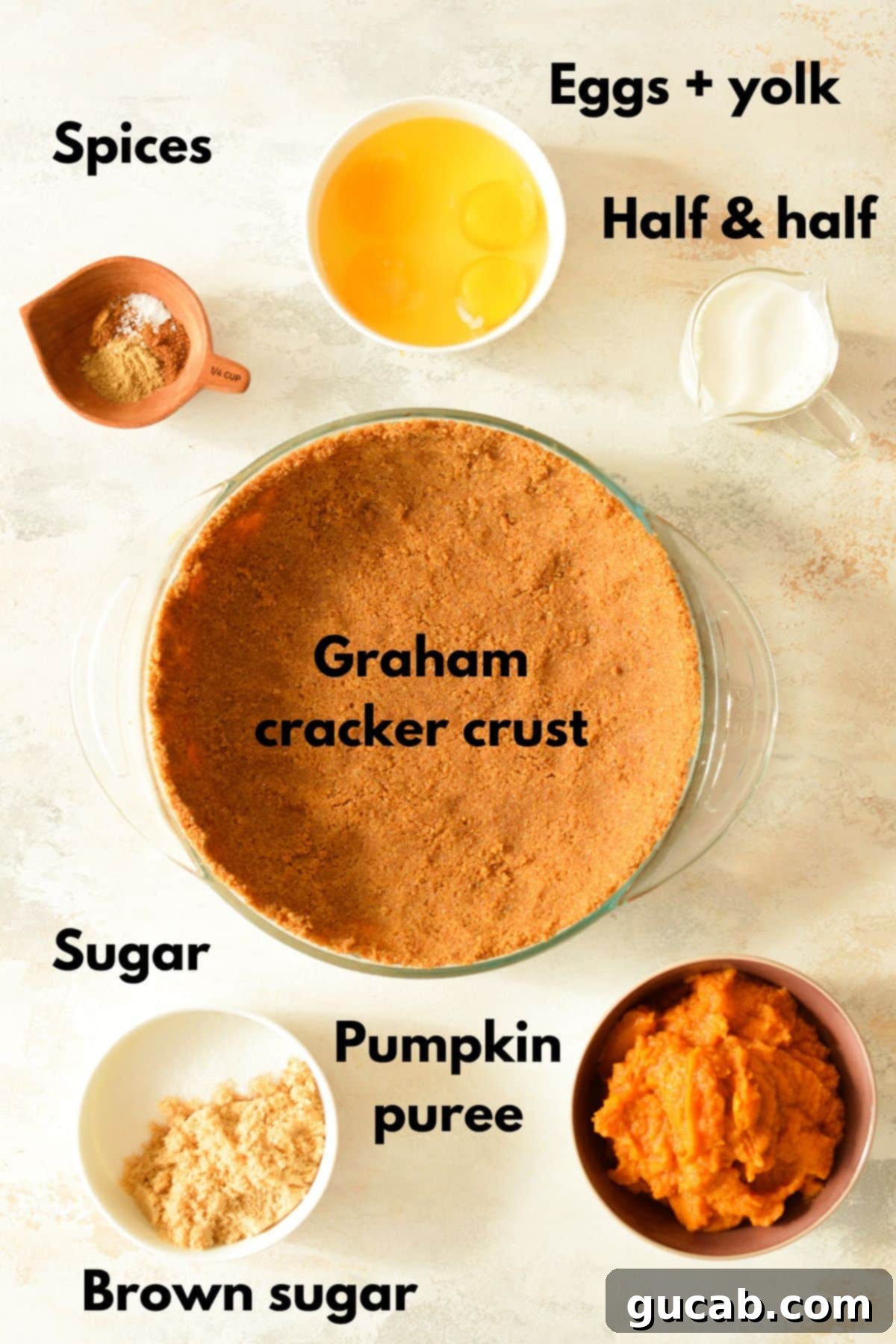 ingredients for a pumpkin pie with a graham cracker crust
