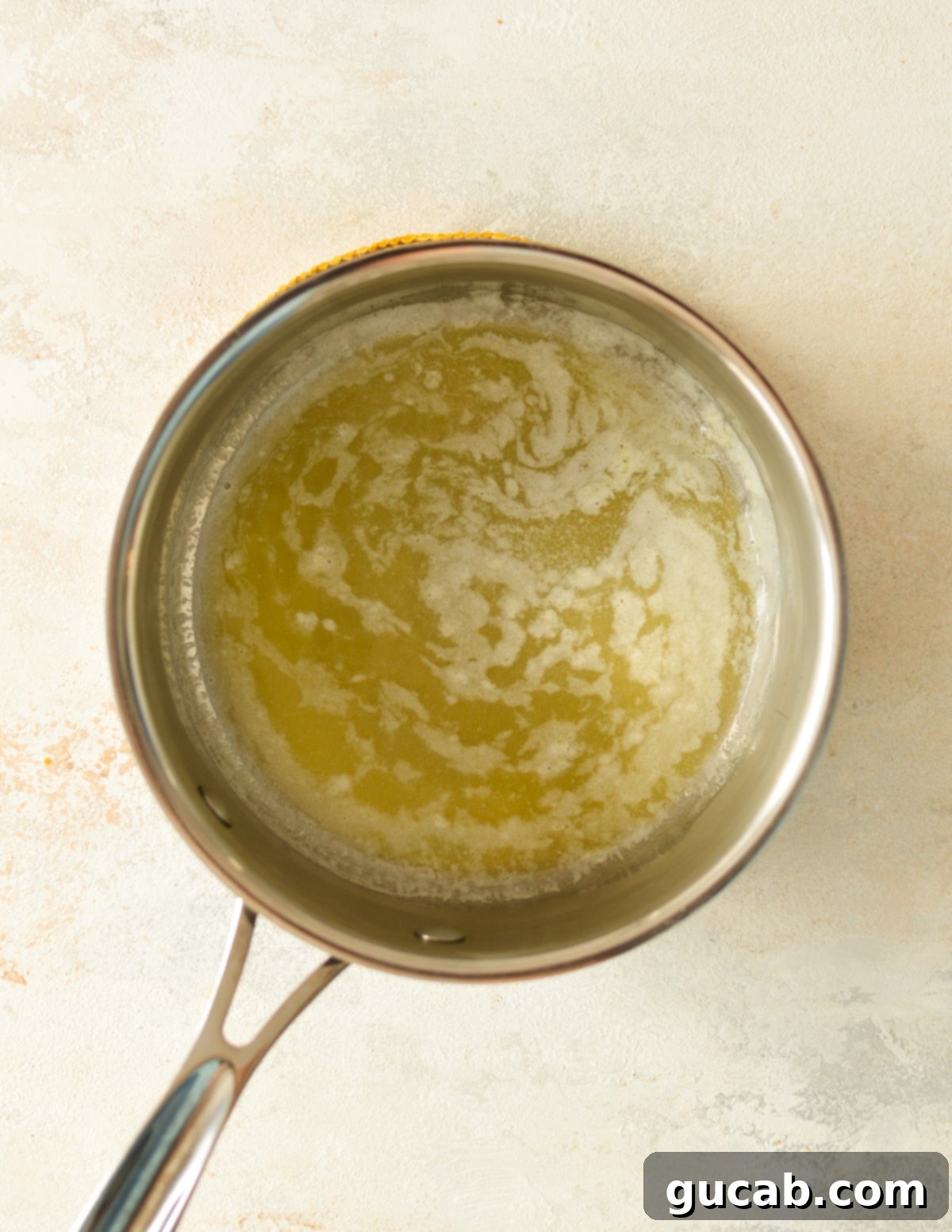 melted butter simmering in a saucepan