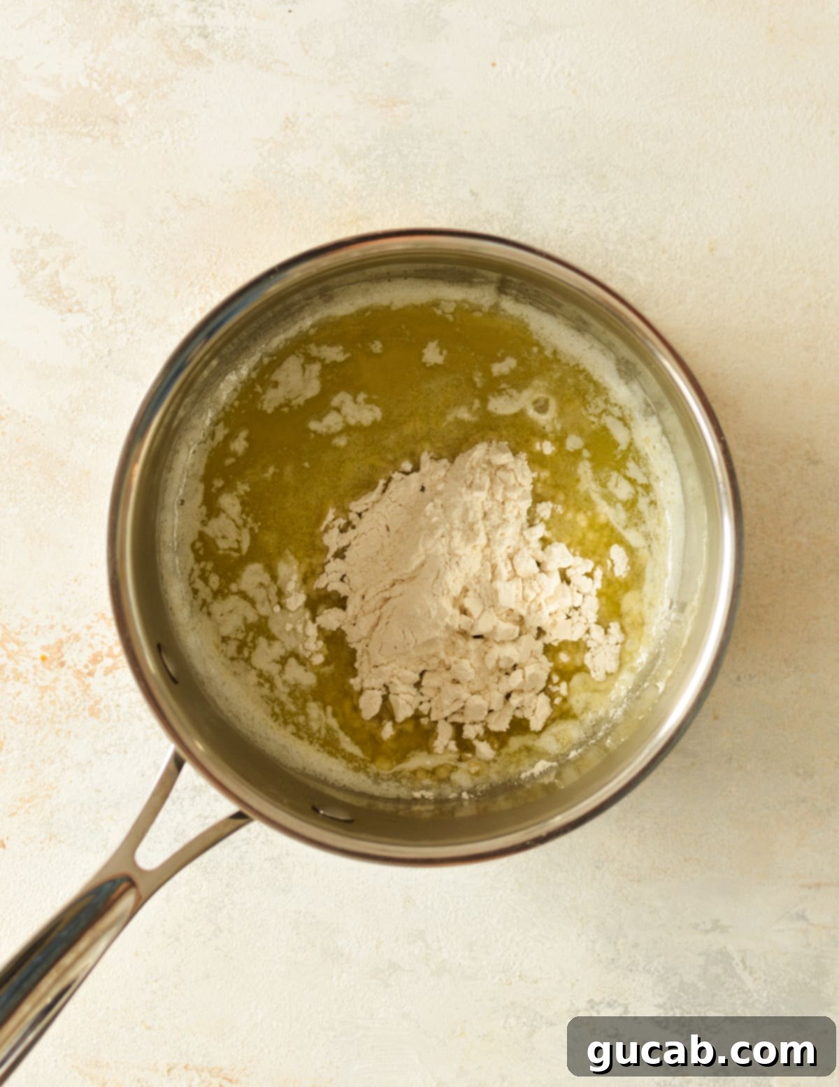 melted butter and gluten-free flour combined in a saucepan