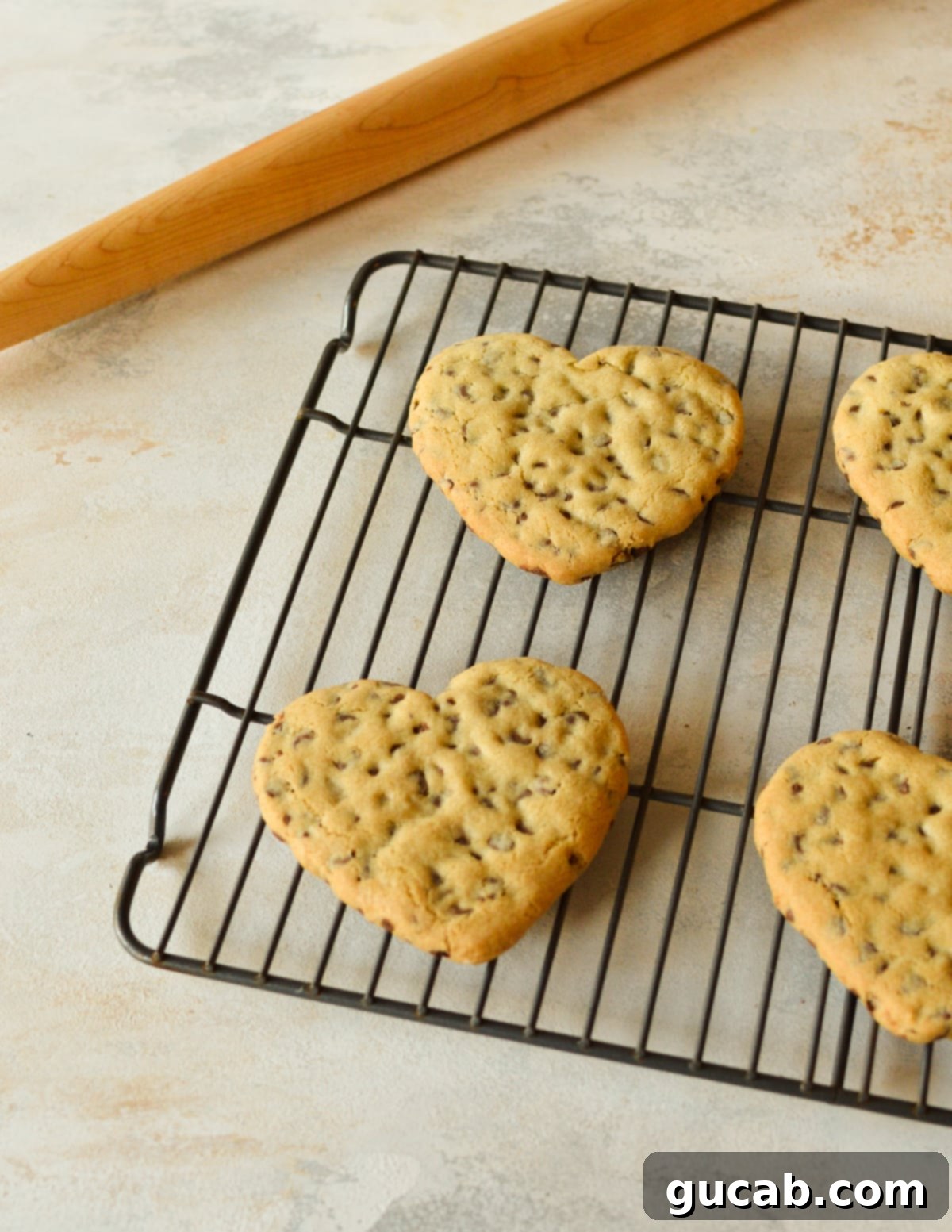 Sweetheart Chocolate Chip Delights 12 heart cookies on a cooling rack