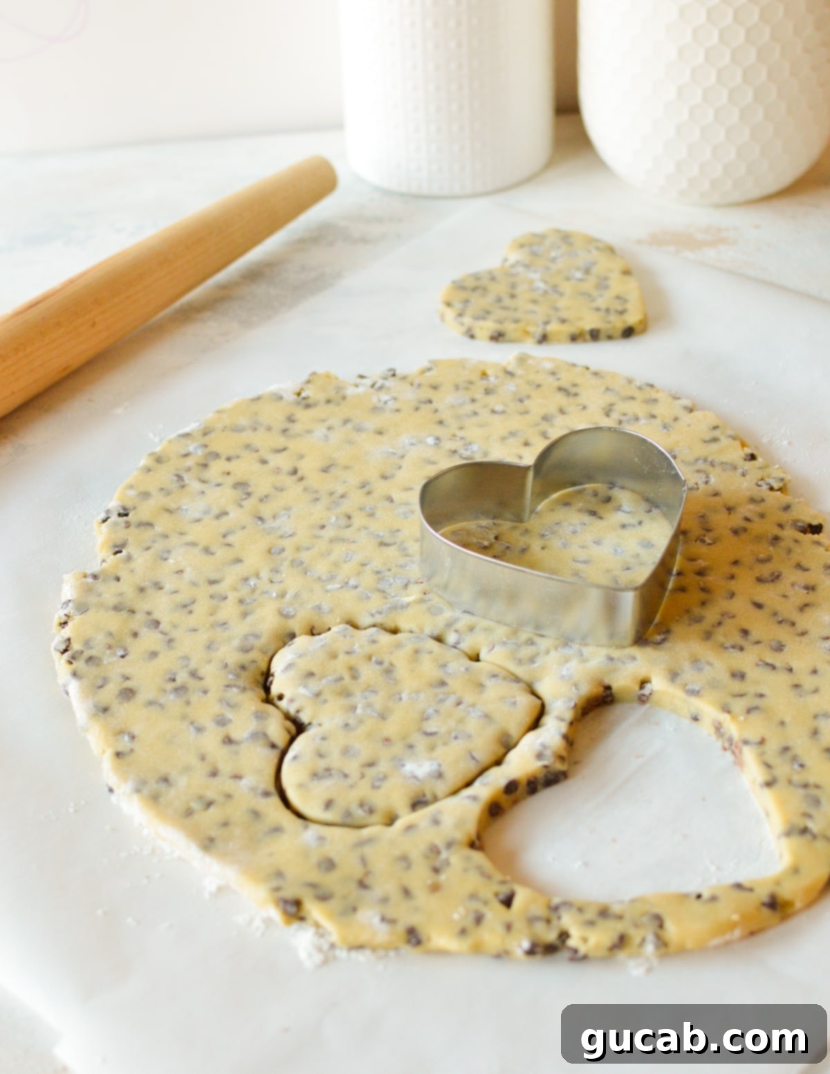 Sweetheart Chocolate Chip Delights 9 cookie dough rolled thin with hearts cut out of it