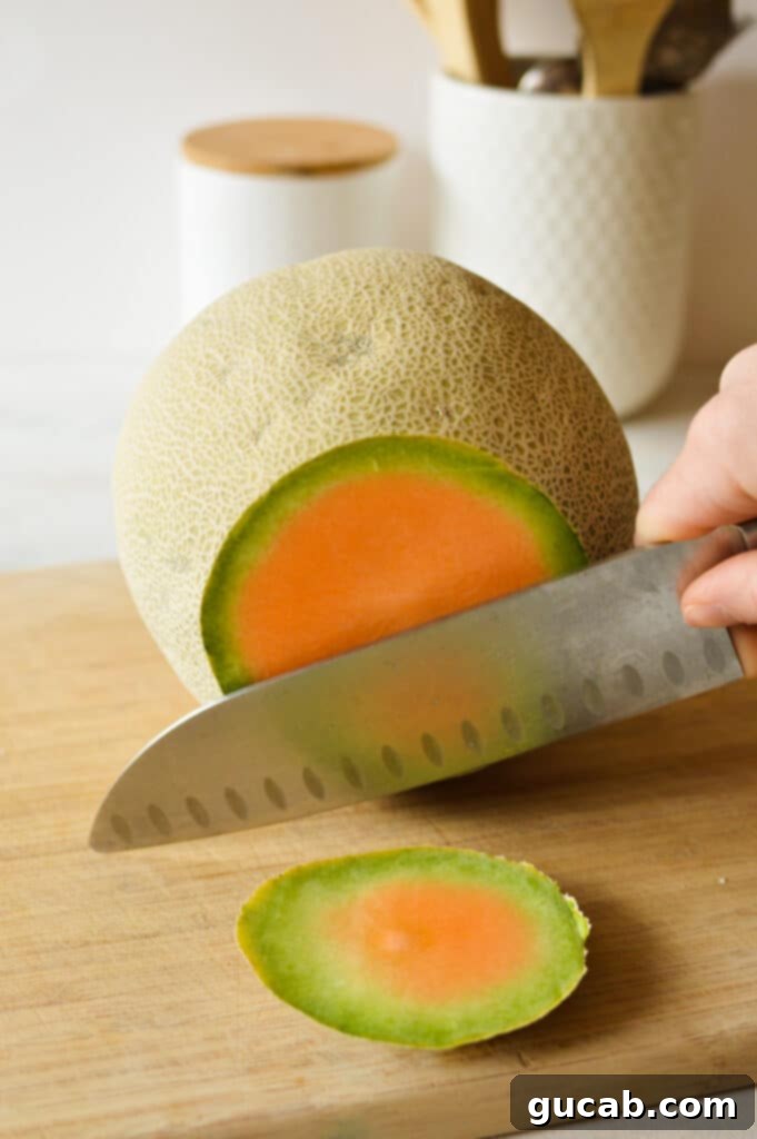 a cantaloupe with the top cut off. 