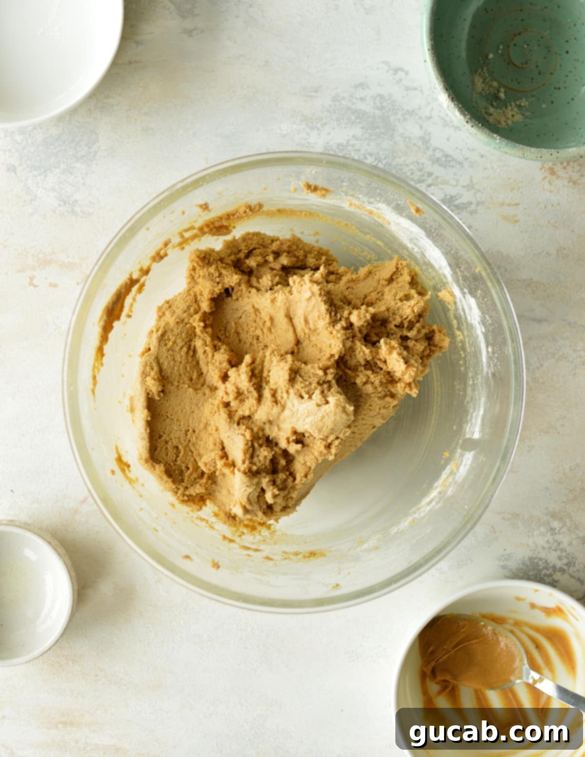 well-mixed peanut butter cookie dough with oat flour, ready for scooping.