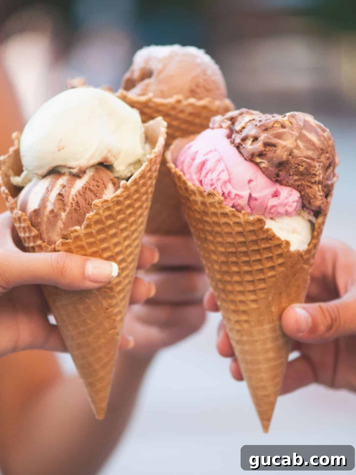 13 Nostalgic Ice Cream Maker Recipes 3 three waffles cones with triple scoops of ice cream.