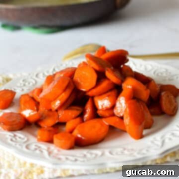 glazed stovetop carrots on a plate.