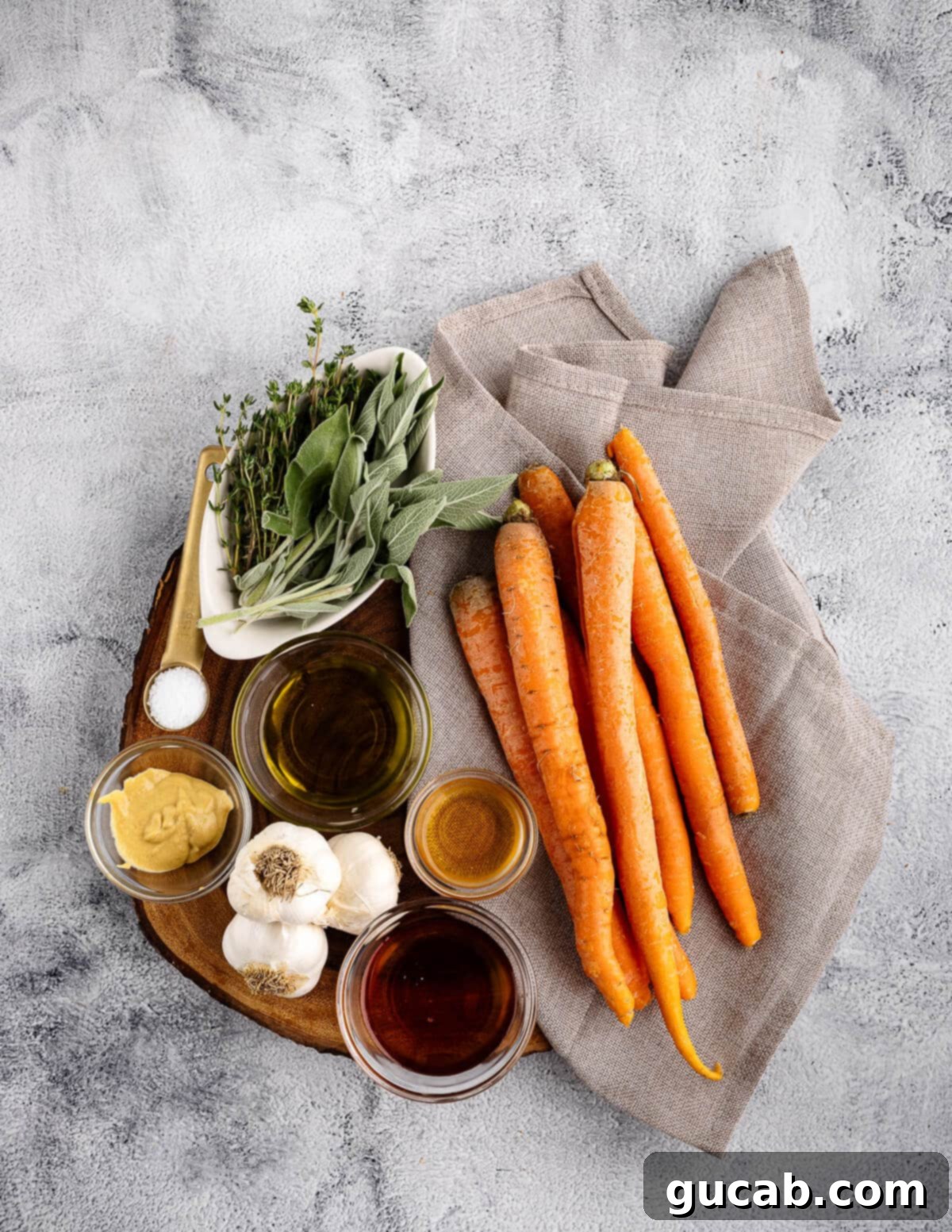 Maple-Glazed Roasted Carrots 3 whole carrots, sage, thyme, olive oil, maple syrup, garlic, mustard, apple cider vinegar, and salt.