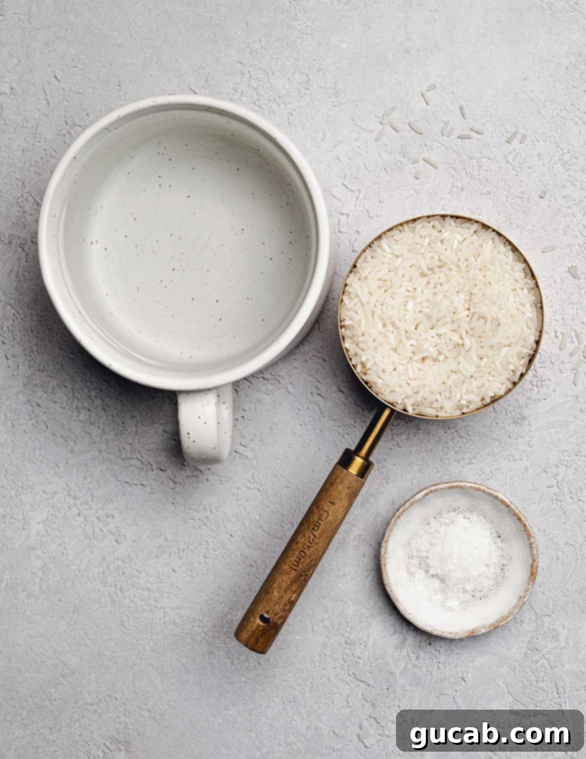 The three essential ingredients for perfect white rice: water, long grain white rice, and kosher salt.