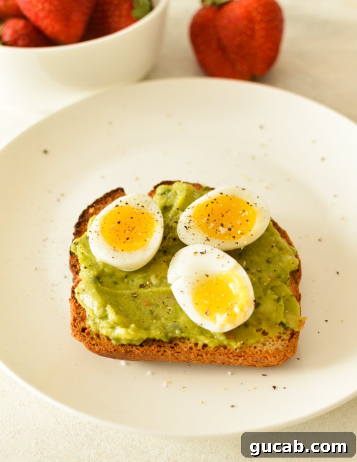 soft boiled quail eggs on avocado toast