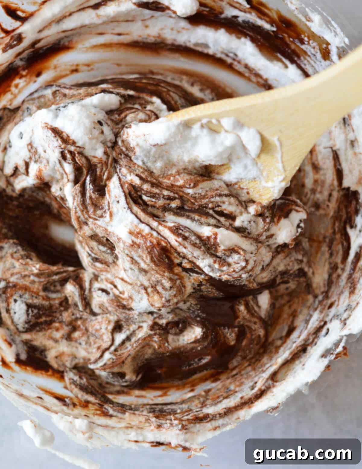 stirring chocolate mousse,