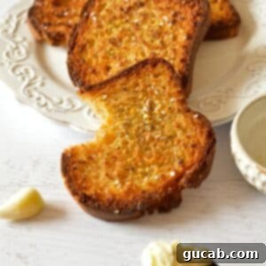 Perfectly toasted slices of homemade garlic bread.