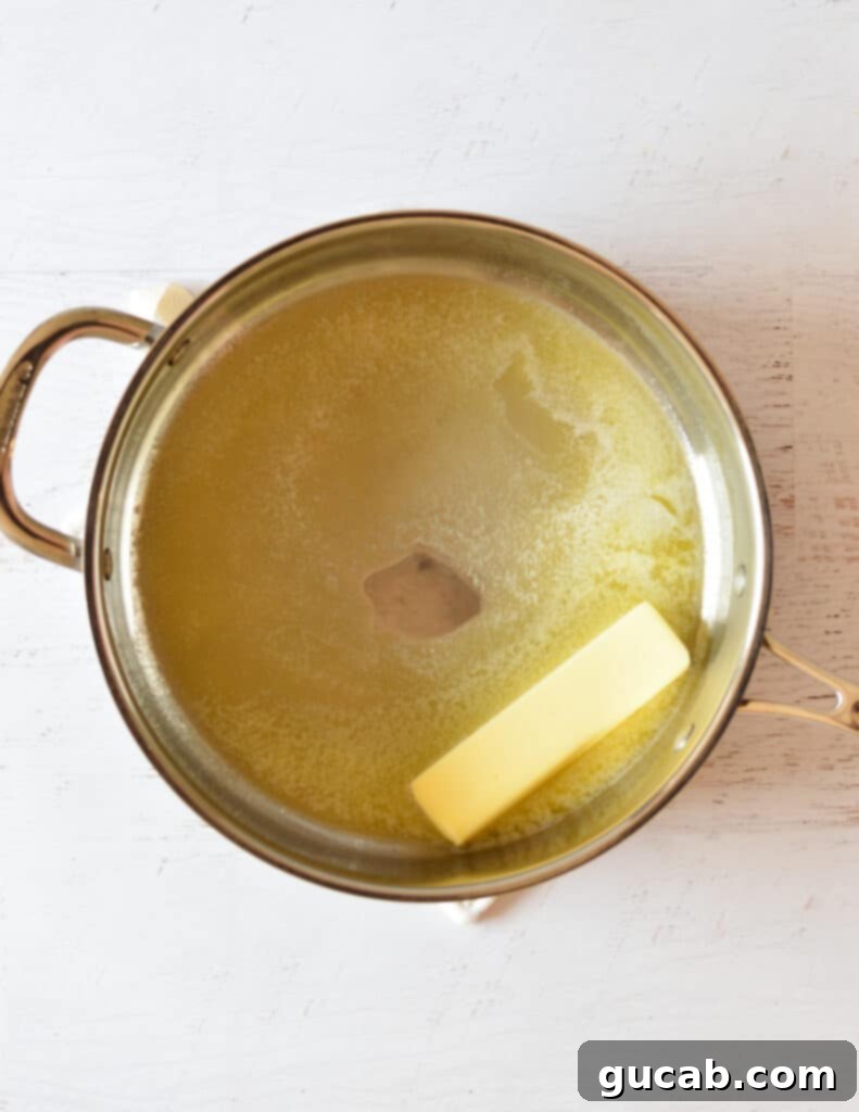 butter melting in a hot skillet.