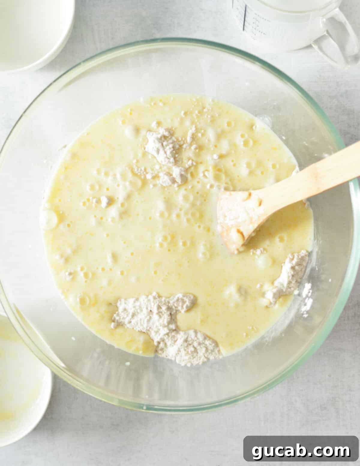 buttermilk and flour in a bowl, showing the consistency of the batter.