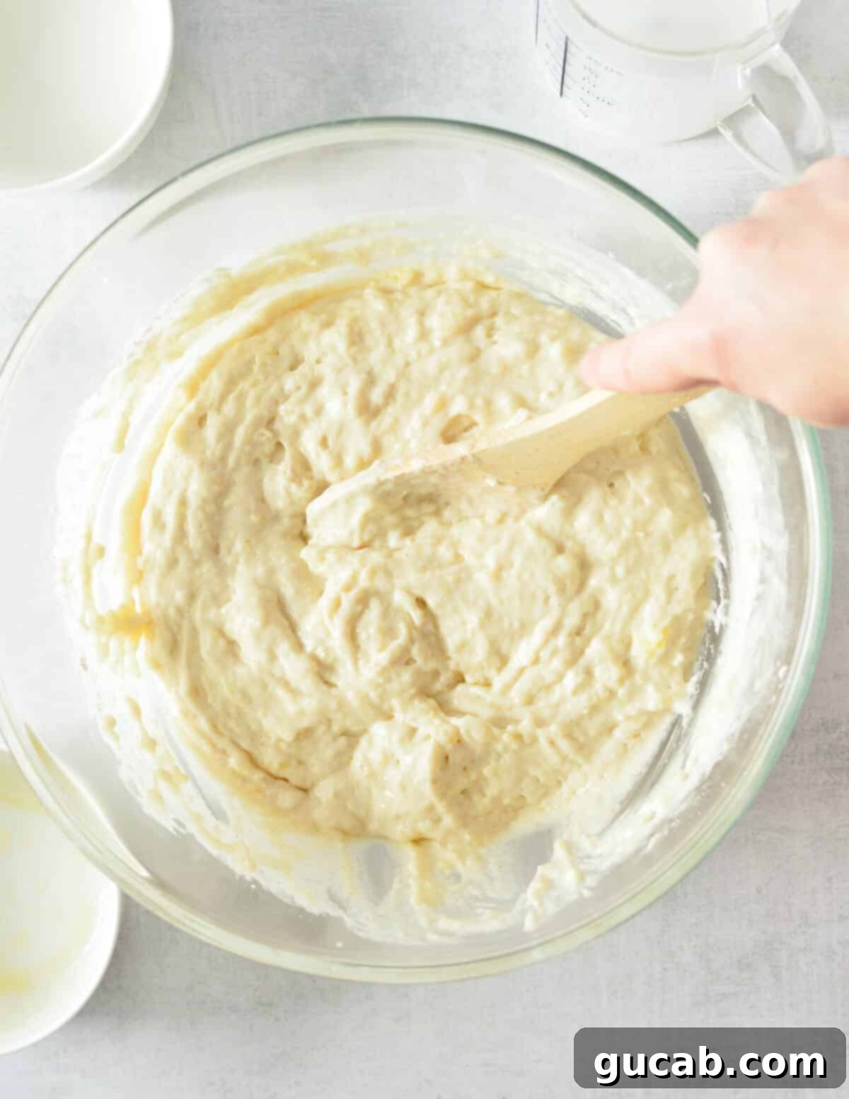 a bowl of fluffy pancake batter after resting.