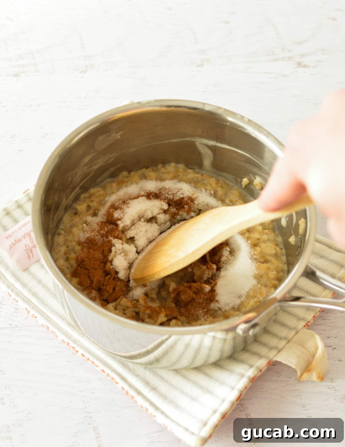 oatmeal with cinnamon and sugar in a saucepan. 