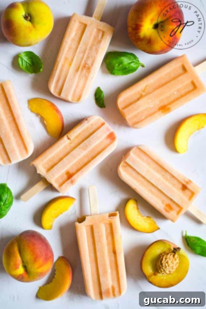 peach popsicles near peach slices. 