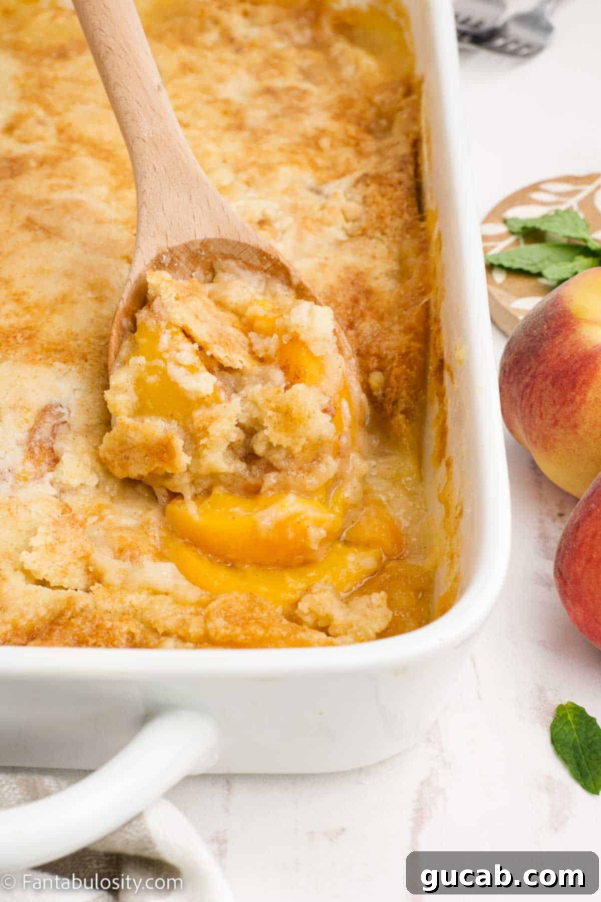 a large spoonful of peach cobbler. 