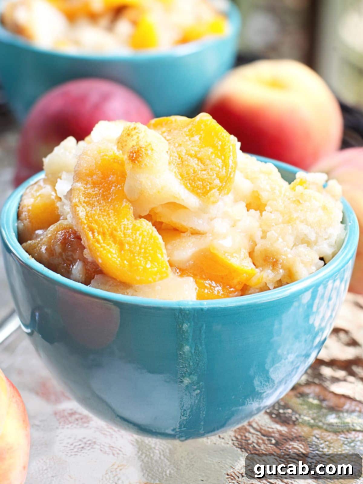 Sweet Chill: 15 Irresistible Frozen Peach Recipes 2 a bowl of ice cream with frozen peaches.