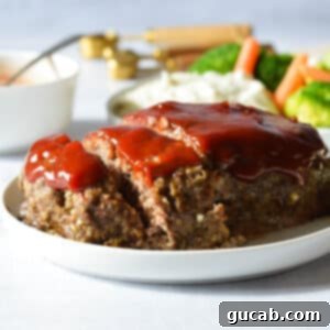 sliced meatloaf on a plate.