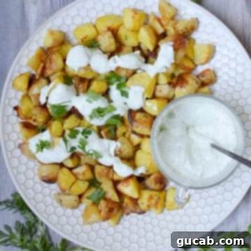 crispy oven roasted potatoes with herb sour cream
