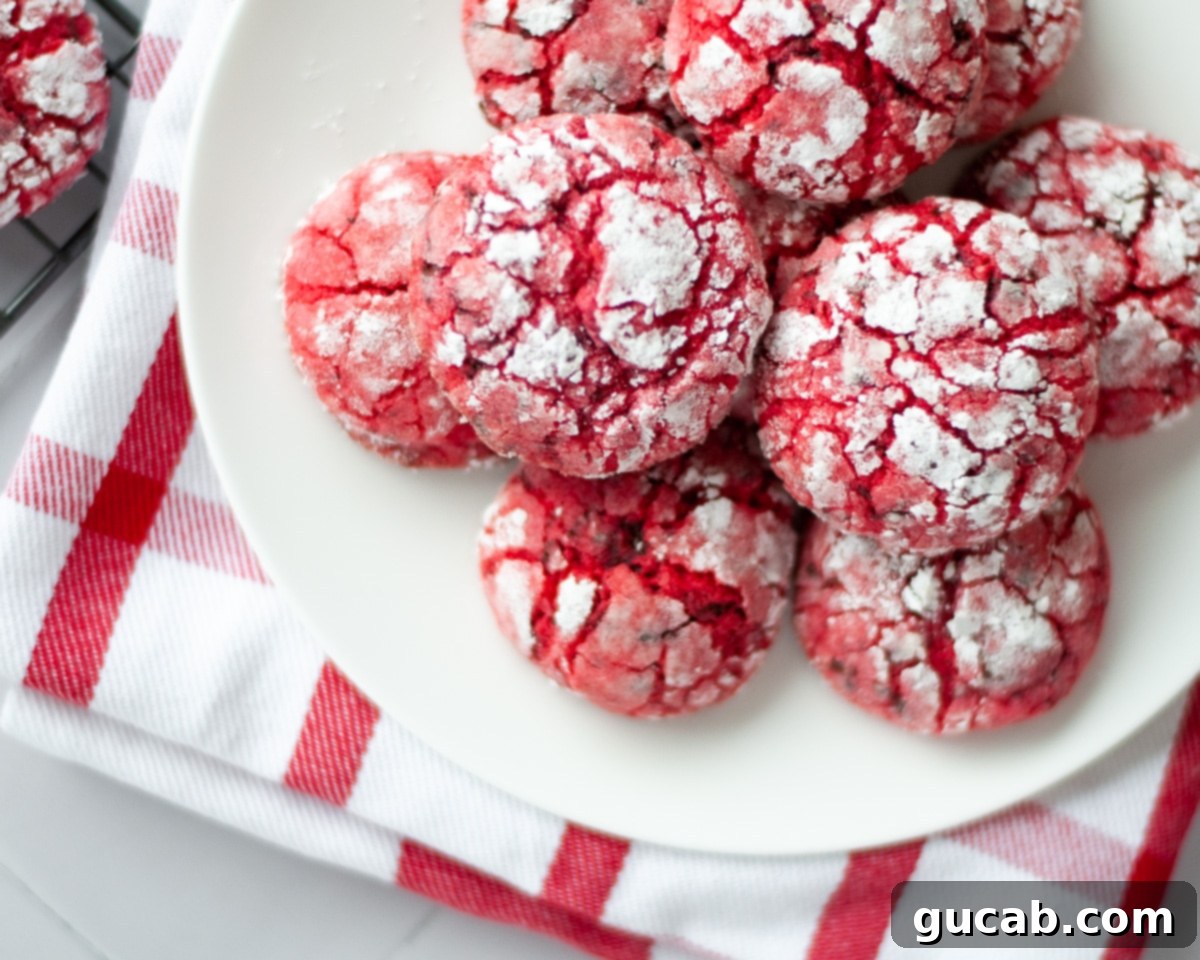 Next-Level Cookies: 25 Recipes You Need to Bake 22 A plate of vibrant chocolate cherry crinkle cookies.