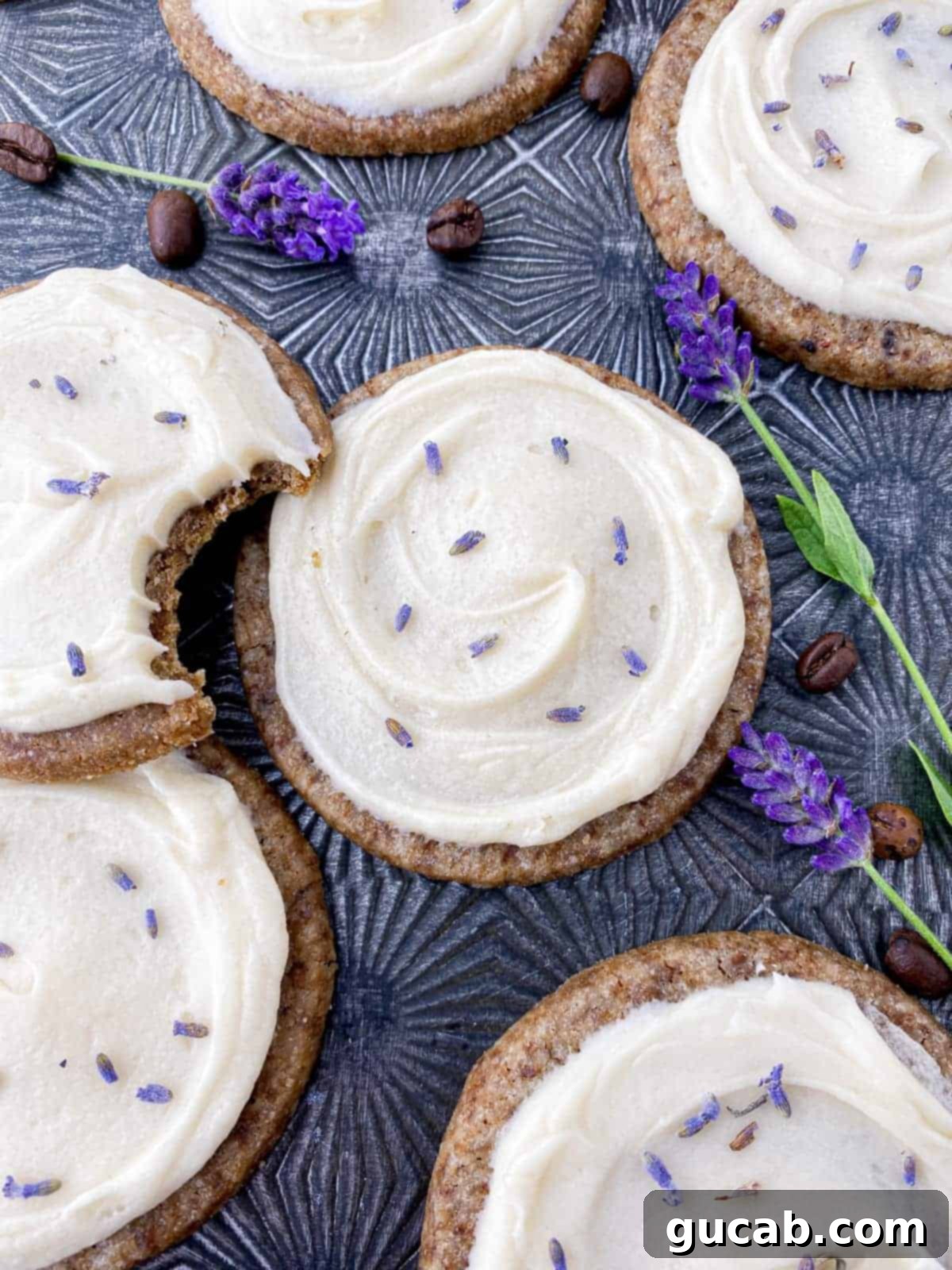 Next-Level Cookies: 25 Recipes You Need to Bake 5 Elegant honey lavender cookies arranged on a sheet pan.