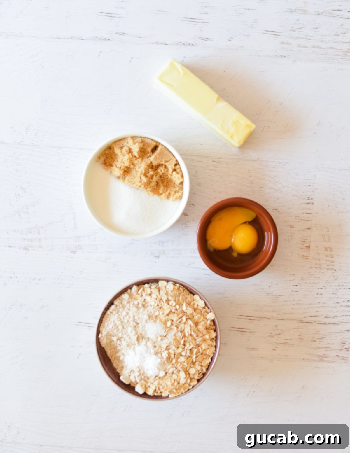 butter, sugar, brown sugar, eggs, oats, and oat flour. 