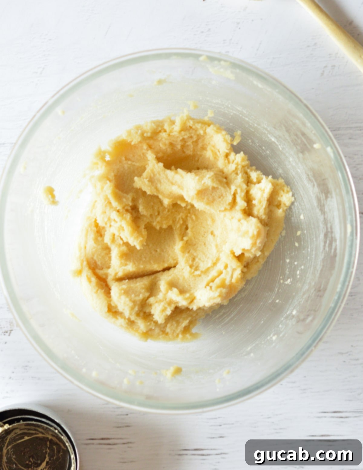 A bowl of light and fluffy creamed butter and sugar, indicating proper aeration.