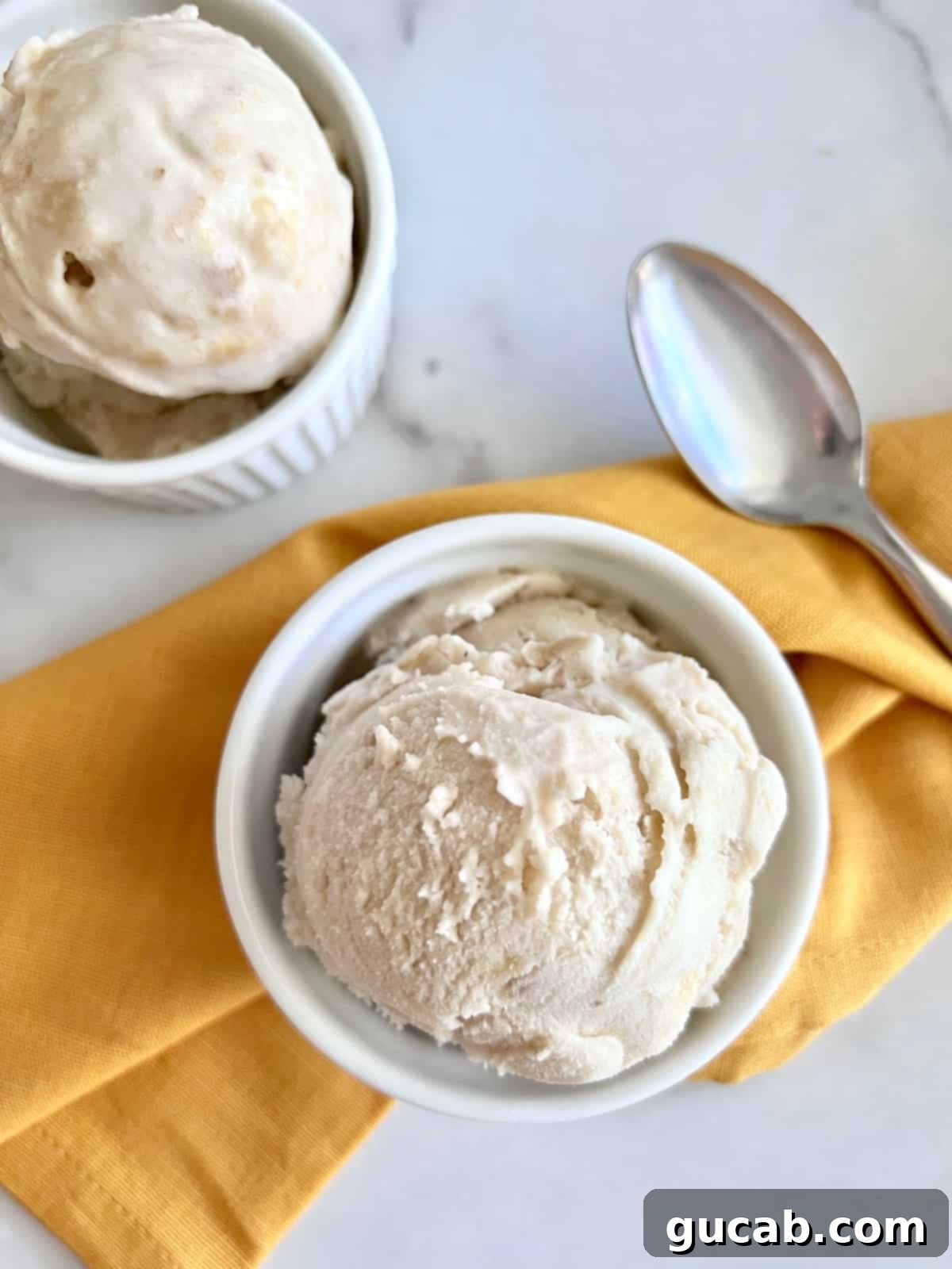 17 Delicious Frozen Banana Treats 21 banana ice cream in a bowl.