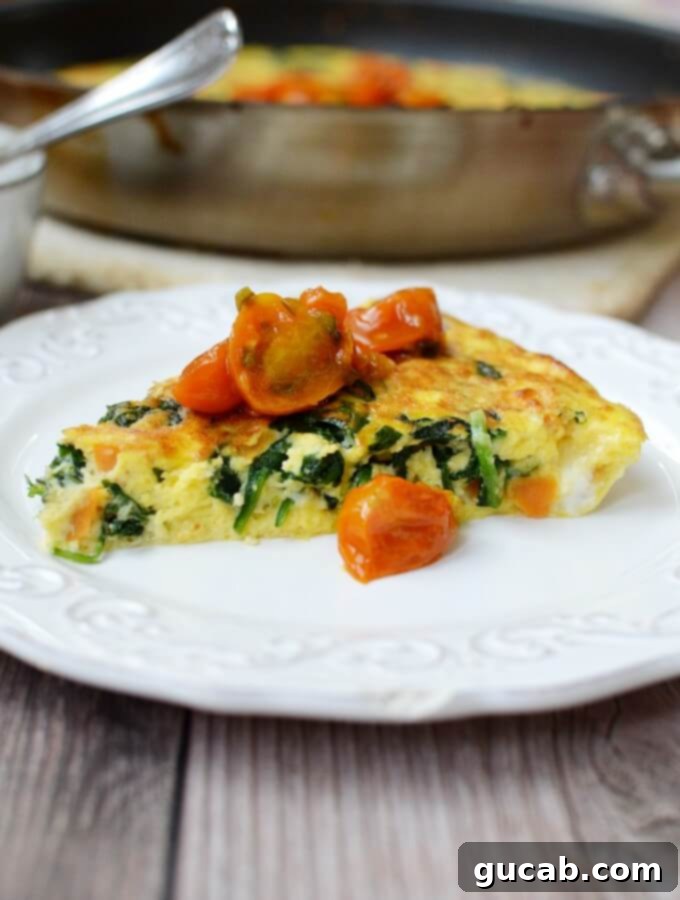 Close-up of a homemade spinach frittata with creamy texture