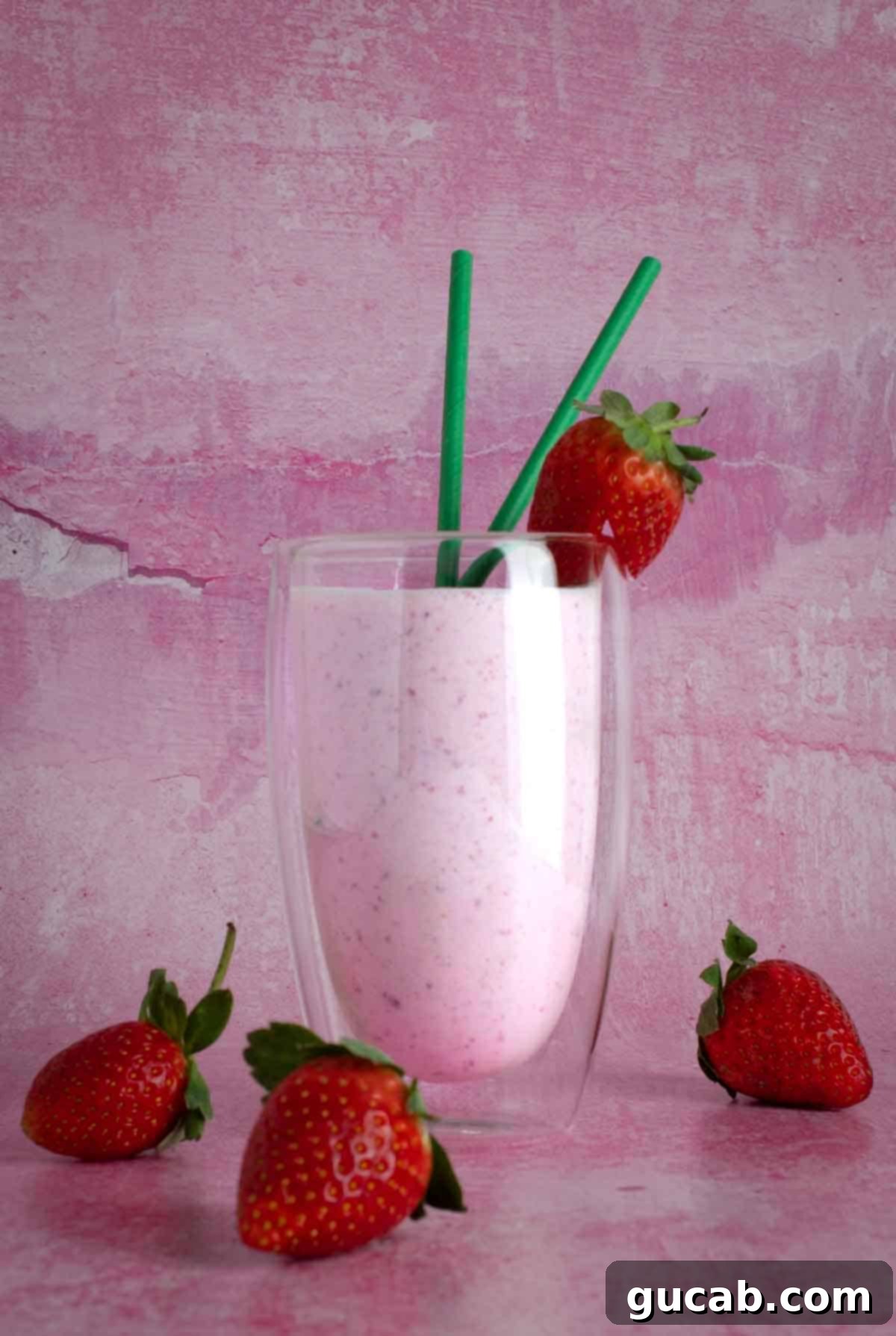 23 Irresistible Frozen Strawberry Delights 11 a strawberry lassi in a glass