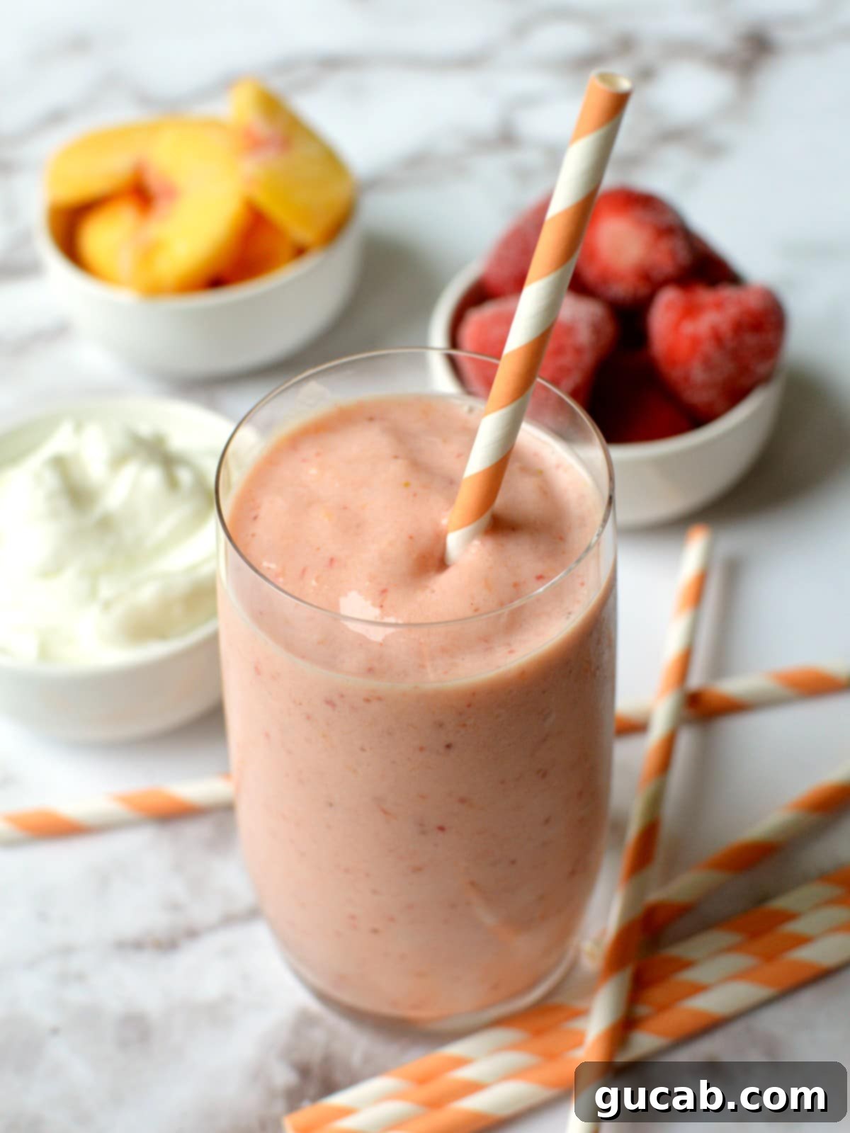23 Irresistible Frozen Strawberry Delights 8 a strawberry peach smoothie