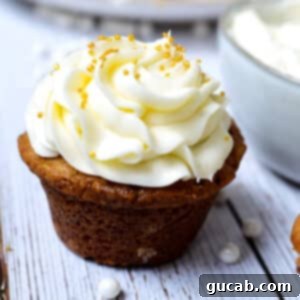 Cupcake with fluffy cream cheese frosting.